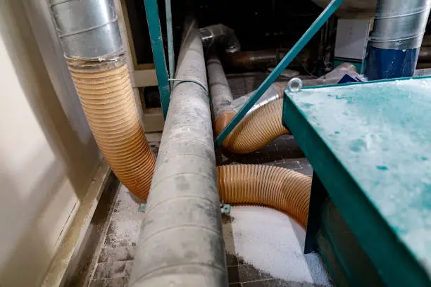 Industrial production of polystyrene foam insulation panels or plates. The process of conversion of pre-expanded polystyrene beads under the action of temperature 120 or 160°C in the heating chamber.